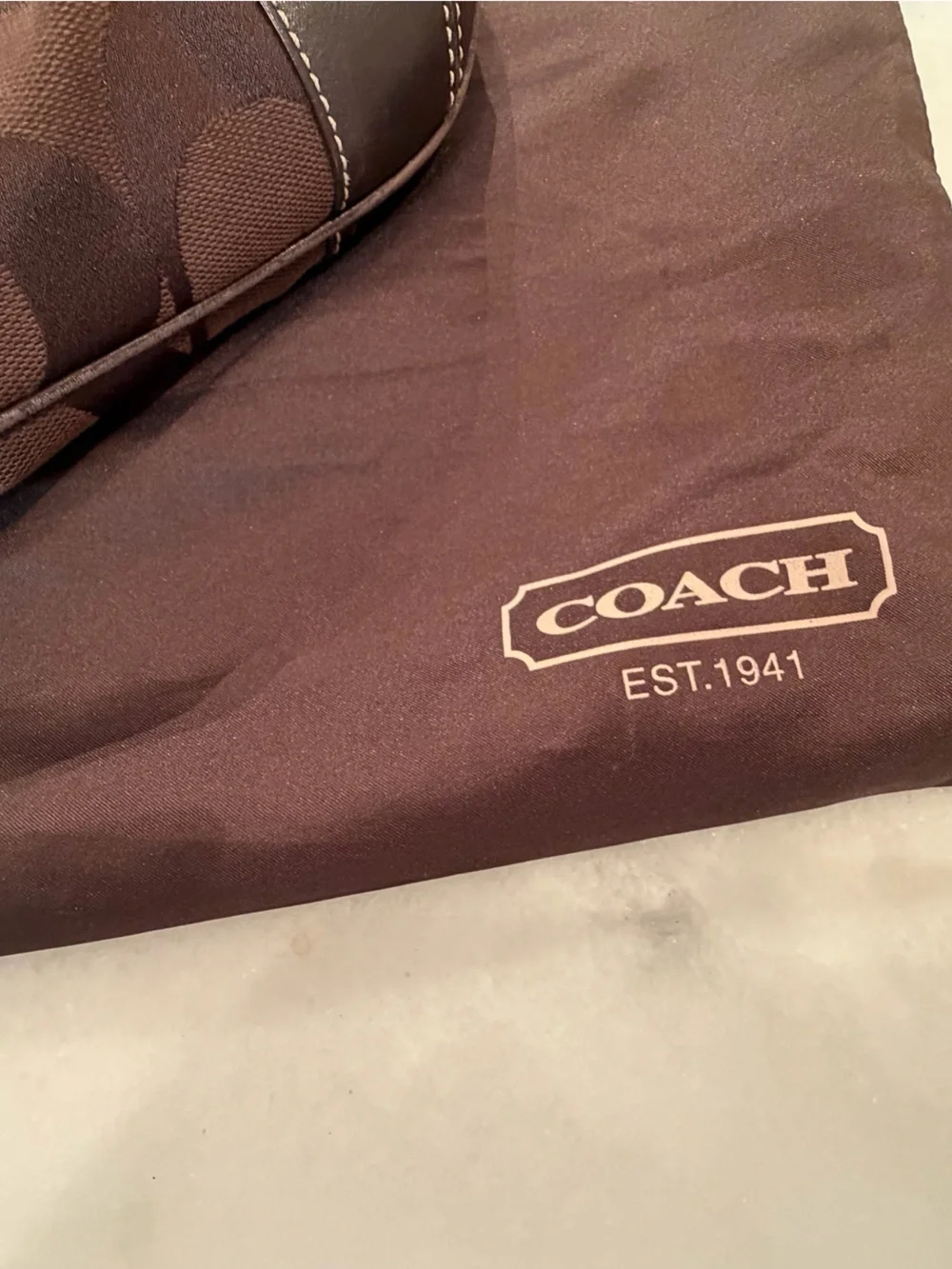 Coach brown polished